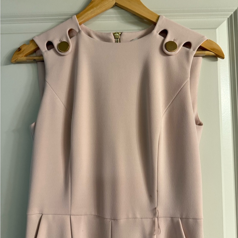 Calvin Klein Elegant Sleeveless Jumpsuit with Gold Accents